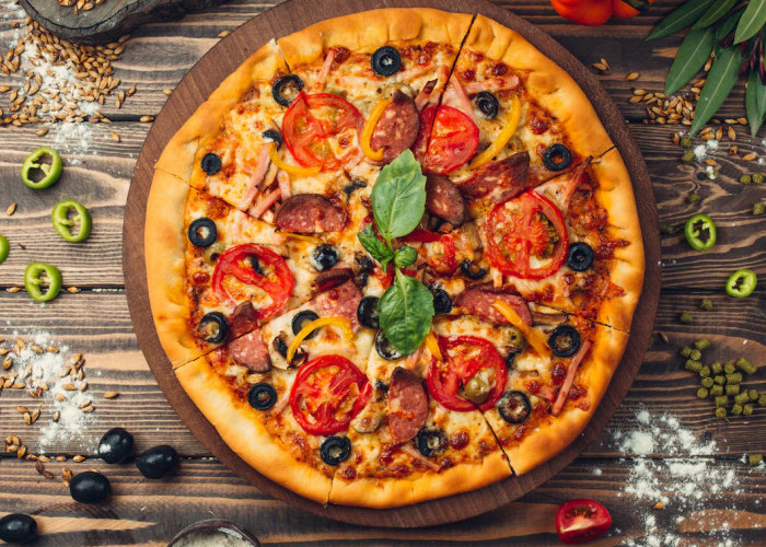 Rekomendasi Sembilan Resto Pizza yang Delizioso. Tak Semuanya Bulat, Ada yang Model Lipat!